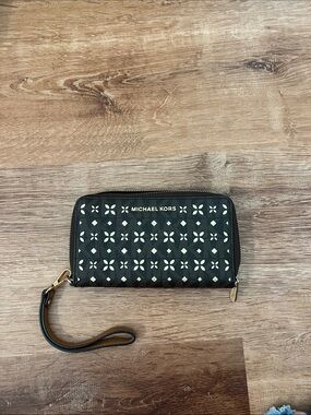 Michael Kors Black Perforated Floral Zip Wristlet